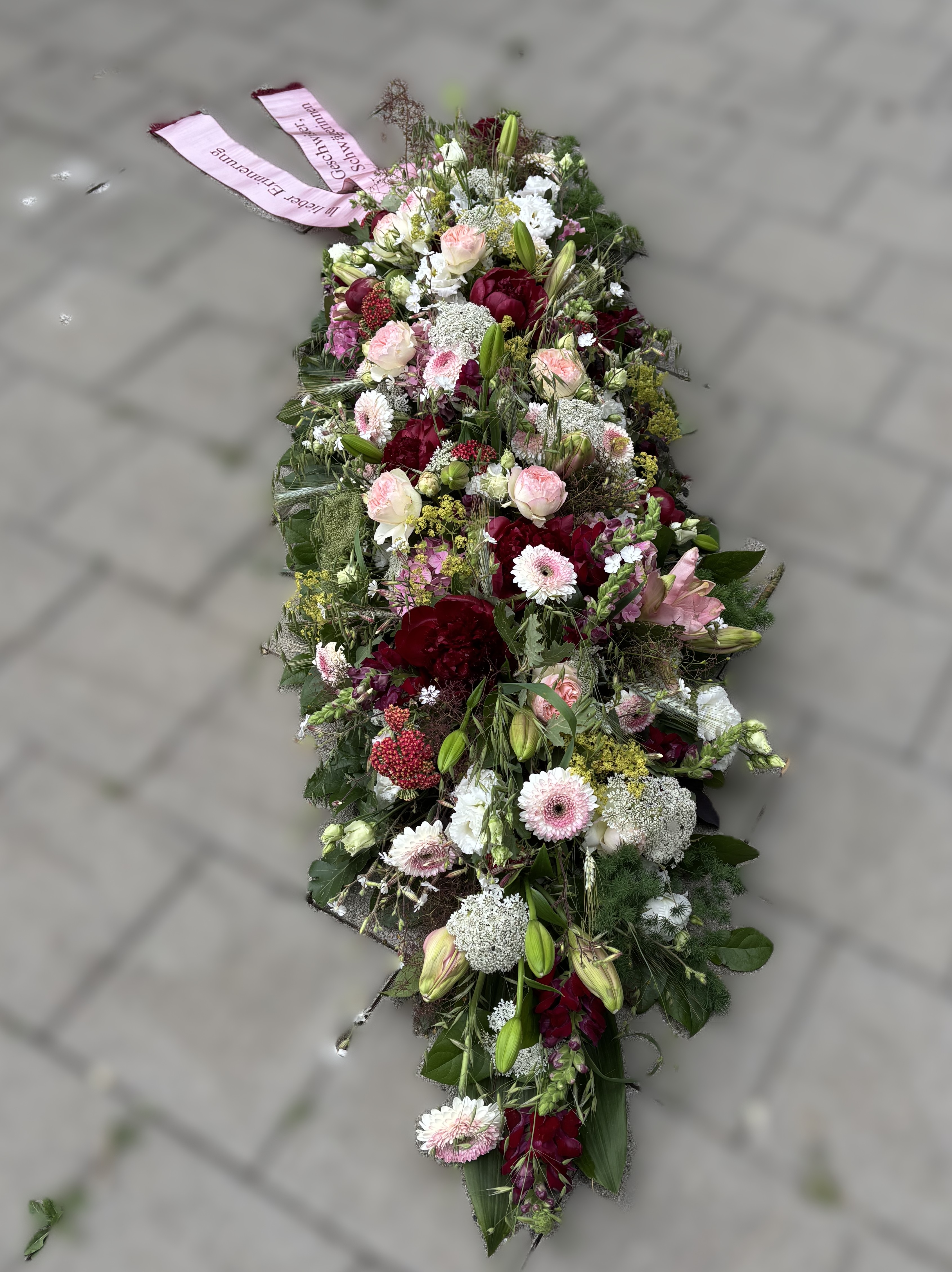 Sargschmuck rosa